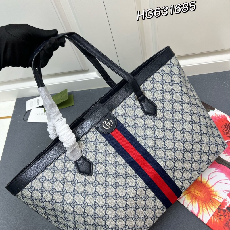 G*u*i shopping bags